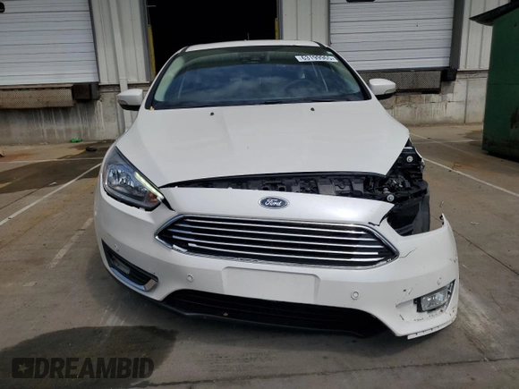 2017 Ford Focus Titanium with VIN 1FADP3N24HL206365, listed as a Copart auction lot 63199965 with 51,435 mi miles and Salvage title. Bid and sale history available at DreamBid. Image 5.