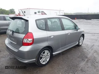 2007 Honda Fit Sport z VIN JHMGD38647S049521, wystawiony jako IAAI lot #42289057 z przebiegiem 130 434 mil mil oraz . Historia ofert i sprzedaży dostępna na DreamBid. Obrazek 4.