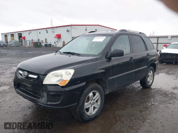 2009 Kia Sportage LX with VIN KNDJE723497612745, listed as a IAAI auction lot 41974301 with 141,110 mi miles and . Bid and sale history available at carsss.com. Image 17.