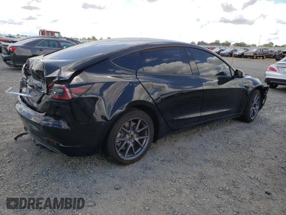 2023 Tesla Model 3 with VIN 5YJ3E1EA6PF454254, listed as a Copart auction lot 56881355 with 30,327 mi miles and Salvage title. Bid and sale history available at DreamBid. Image 3.
