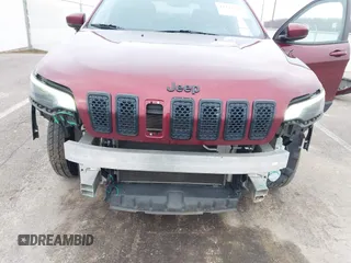 2019 Jeep Cherokee Latitude Plus with VIN 1C4PJMLB1KD319905, listed as a IAAI auction lot 41143311 with 98,694 mi miles. Bid and sale history available at carsss.com. Image 6.