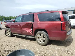 2019 Chevrolet Suburban LS with VIN 1GNSCGKC0KR322367, listed as a Copart auction lot 60295595 with 85,776 mi miles and Salvage title. Bid and sale history available at DreamBid. Image 2.