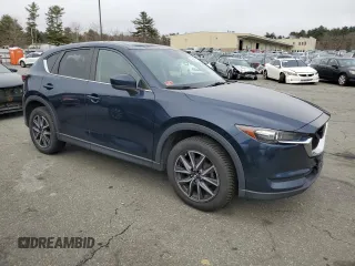 2018 Mazda CX-5 Touring with VIN JM3KFBCM9J0433729, listed as a Copart auction lot 49945515 with 143,064 mi miles and Salvage Title. Bid and sale history available at carsss.com. Image 4.