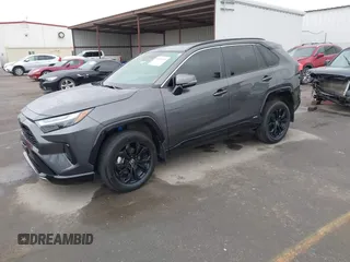 2024 Toyota RAV4 Hybrid SE with VIN 2T3T6RFV0RW055852, listed as a IAAI auction lot 41804088 with 36,428 mi miles and . Bid and sale history available at DreamBid. Image 2.