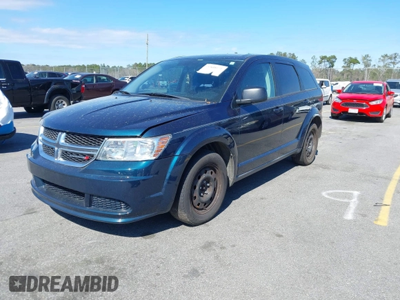 2014 Dodge Journey American Value Pkg with VIN 3C4PDCAB4ET103534, listed as a IAAI auction lot 41805531 with 175,310 mi miles. Bid and sale history available at carsss.com. Image 2.