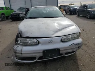 2003 Oldsmobile Alero GL1 z VIN 1G3NL52E83C168023, wystawiony jako Copart lot #76242984 z przebiegiem 154 718 mil mil oraz Szkoda całkowita • Salvage title. Historia ofert i sprzedaży dostępna na DreamBid. Obrazek 5.