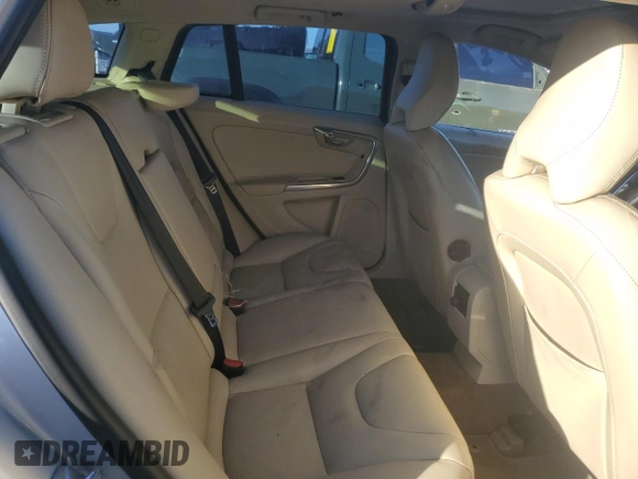 2015 Volvo V60 z VIN YV1612SB6F1211119, wystawiony jako Copart lot #77466004 z przebiegiem 144 388 mil mil oraz Szkoda całkowita • Salvage title. Historia ofert i sprzedaży dostępna na DreamBid. Obrazek 10.