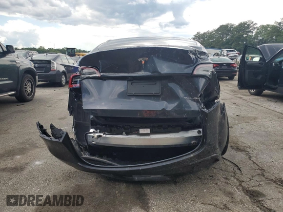 2024 Tesla Model Y Long Range с VIN 7SAYGDEE7RA271520, выставлен на аукционе Copart как лот 56526025 с пробегом 28 745 миль миль и Списание • Salvage title. История ставок и продаж доступна на DreamBid. Изображение 6.