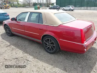 2006 Cadillac DTS w/1SE with VIN 1G6KD57996U113240, listed as a IAAI auction lot 42120004 with 120,806 mi miles. Bid and sale history available at carsss.com. Image 3.