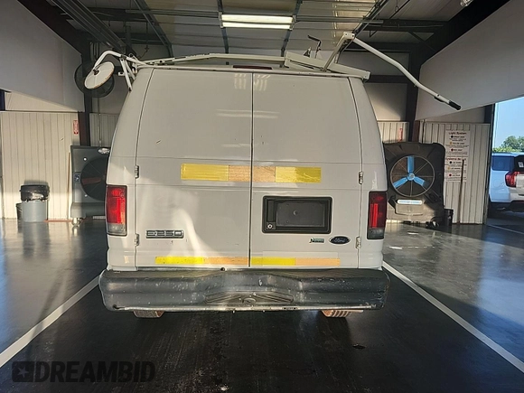 2010 Ford Econoline Cargo Commercial with VIN 1FTNE2EW4ADA72071, listed as a IAAI auction lot 42598880 with 186,263 mi miles and . Bid and sale history available at DreamBid. Image 4.