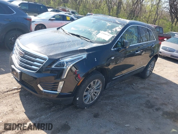 2017 Cadillac XT5 Luxury AWD z VIN 1GYKNDRS4HZ184818, wystawiony jako IAAI lot #42000747 z przebiegiem 46 633 mil mil oraz . Historia ofert i sprzedaży dostępna na DreamBid. Obrazek 21.