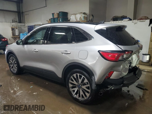 2020 Ford Escape Titanium Hybrid z VIN 1FMCU9DZ6LUB39475, wystawiony jako Copart lot #50159215 z przebiegiem 76 496 mil mil oraz Szkoda całkowita • Salvage title. Historia ofert i sprzedaży dostępna na DreamBid. Obrazek 2.