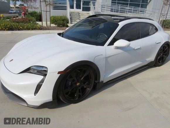 2022 Porsche Taycan 4 with VIN WP0BA2Y19NSA67581, listed as a Copart auction lot 55142525 with 6,775 mi miles and Salvage Title. Bid and sale history available at DreamBid. Image 2.
