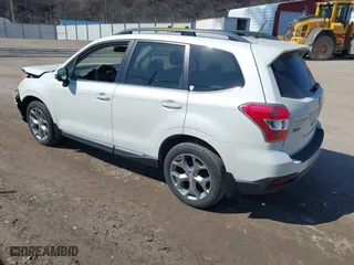 2015 Subaru Forester 2.5i Touring with VIN JF2SJAWC5FH546754, listed as a IAAI auction lot 41665828 with 97,231 mi miles. Bid and sale history available at carsss.com. Image 3.
