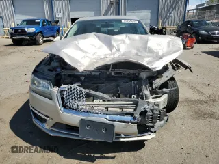 2017 Lincoln MKZ Hybrid Reserve z VIN 3LN6L5MU7HR609878, wystawiony jako Copart lot #55265635 z przebiegiem 81 431 mil mil oraz Szkoda całkowita • Salvage title. Historia ofert i sprzedaży dostępna na DreamBid. Obrazek 5.