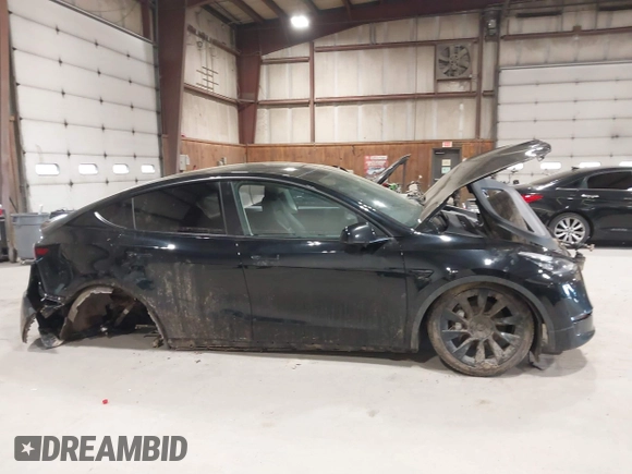 2022 Tesla Model Y Long Range z VIN 7SAYGDEE0NF342215, wystawiony jako IAAI lot #42136858 z przebiegiem 53 037 mil mil oraz . Historia ofert i sprzedaży dostępna na DreamBid. Obrazek 12.