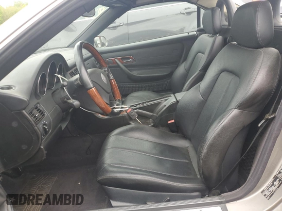 2003 Mercedes-Benz SLK 320 with VIN WDBKK65F33F286090, listed as a Copart auction lot 54711385 with 82,300 mi miles and Salvage title. Bid and sale history available at DreamBid. Image 7.