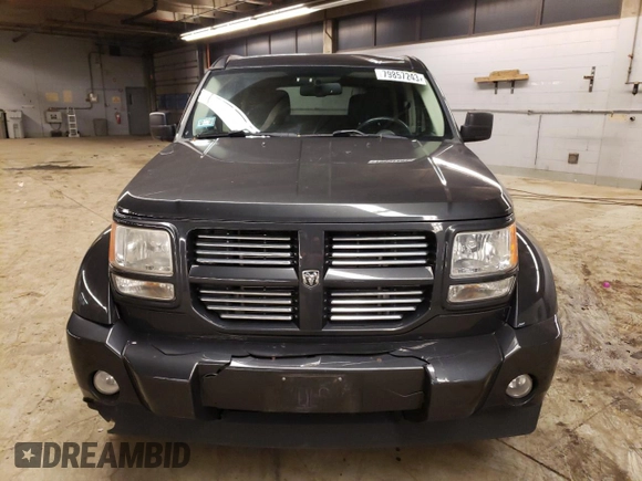 2011 Dodge Nitro SXT z VIN 1D4PT5GK1BW544942, wystawiony jako Copart lot #79857243 z przebiegiem 128 613 mil mil oraz Czysty tytuł • Clean title. Historia ofert i sprzedaży dostępna na DreamBid. Obrazek 5.
