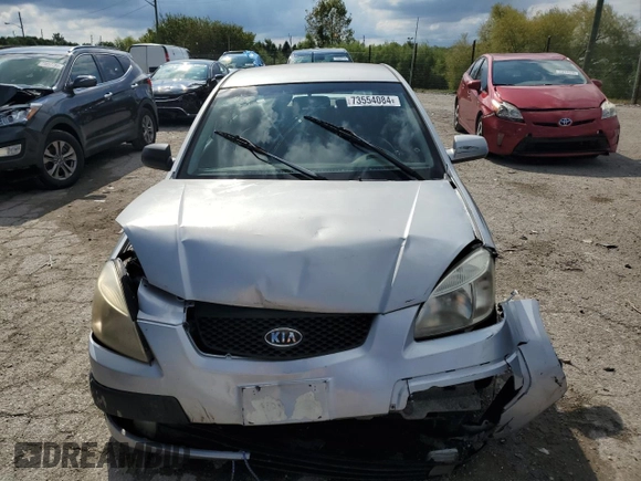 2007 Kia Rio LX with VIN KNADE123776231384, listed as a Copart auction lot 73554084 with 0 mi miles and Salvage Title. Bid and sale history available at carsss.com. Image 5.