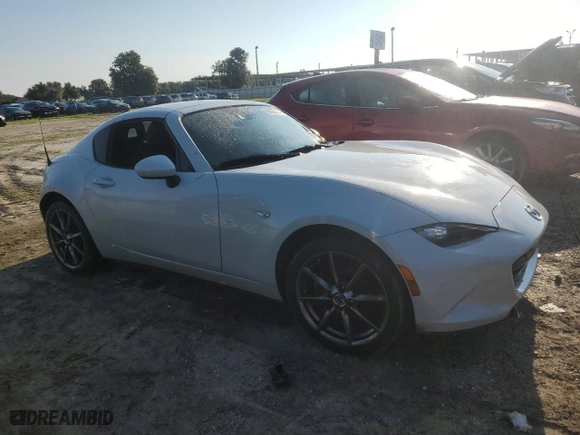 2018 Mazda MX-5 Miata RF Grand Touring with VIN JM1NDAM71J0204220, listed as a Copart auction lot 66686194 with 53,022 mi miles and Non Repairable. Bid and sale history available at carsss.com. Image 4.