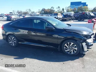 2016 Honda Civic EX with VIN 19XFC2F71GE023712, listed as a IAAI auction lot 41824595 with 87,127 mi miles and . Bid and sale history available at DreamBid. Image 14.