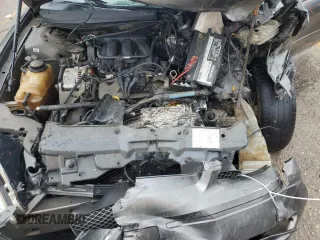 2005 Ford Taurus SE z VIN 1FAFP53U35A138592, wystawiony jako Copart lot #56176905 z przebiegiem Nie podano mil oraz Szkoda całkowita • Salvage title. Historia ofert i sprzedaży dostępna na DreamBid. Obrazek 11.