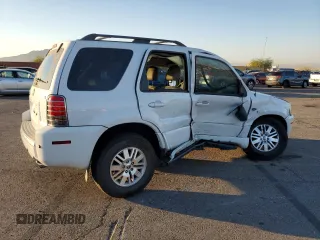 2005 Mercury Mariner Luxury z VIN 4M2CU56175DJ16949, wystawiony jako Copart lot #41901845 z przebiegiem 104 948 mil mil oraz Szkody całkowita. Historia ofert i sprzedaży dostępna na DreamBid. Obrazek 3.
