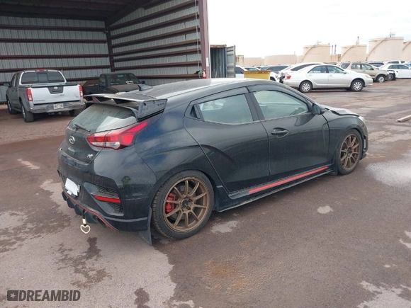 2020 Hyundai Veloster N with VIN KMHT36AHOLU003582, listed as a IAAI auction lot 40958146 with 33,943 mi miles. Bid and sale history available at carsss.com. Image 4.