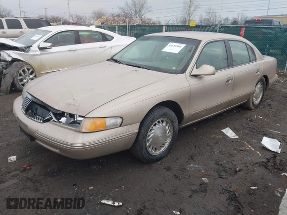 1997 Lincoln Continental with VIN 1LNLM97V3VY666104, listed as a IAAI auction lot 41650904 with 181,536 mi miles. Bid and sale history available at carsss.com. Image 2.