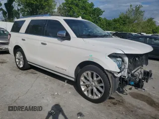 2019 Ford Expedition Platinum with VIN 1FMJU1MT6KEA23724, listed as a Copart auction lot 58489015 with 104,539 mi miles and Salvage title. Bid and sale history available at DreamBid. Image 4.