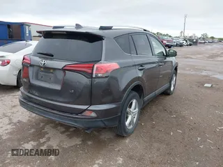 2016 Toyota RAV4 LE with VIN JTMZFREV3GJ095589, listed as a IAAI auction lot 41925815 with 298,773 mi miles. Bid and sale history available at carsss.com. Image 4.
