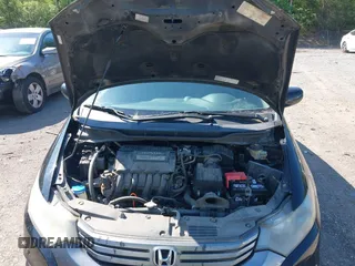 2010 Honda Insight LX with VIN JHMZE2H5XAS018840, listed as a IAAI auction lot 42138165 with 188,467 mi miles and . Bid and sale history available at DreamBid. Image 10.