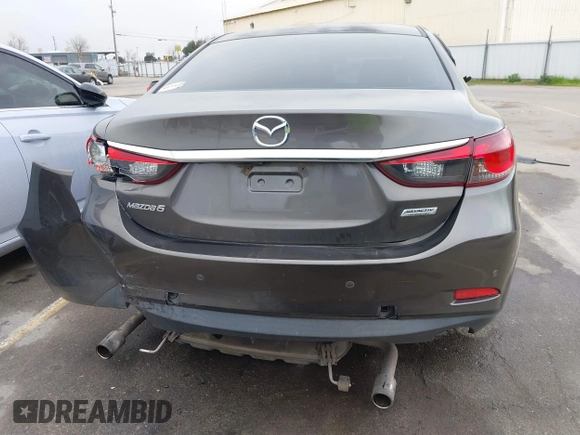 2016 Mazda 6 i Touring with VIN JM1GJ1V52G1473330, listed as a IAAI auction lot 41657684 with 138,064 mi miles and . Bid and sale history available at DreamBid. Image 16.