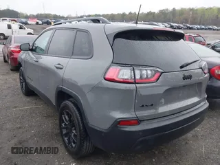 2023 Jeep Cherokee Altitude Lux with VIN 1C4PJMMB8PD114958, listed as a IAAI auction lot 41862302 with 64,341 mi miles. Bid and sale history available at carsss.com. Image 3.