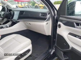 2023 Jeep Wagoneer Series II with VIN 1C4SJRBP4PS562826, listed as a IAAI auction lot 42600245 with 62,557 mi miles and . Bid and sale history available at DreamBid. Image 5.