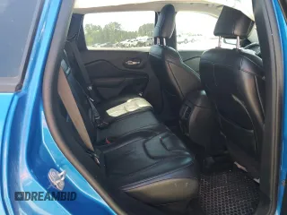 2019 Jeep Cherokee Trailhawk Elite z VIN 1C4PJMBXXKD309306, wystawiony jako Copart lot #53428305 z przebiegiem 99 448 mil mil oraz Szkoda całkowita • Salvage title. Historia ofert i sprzedaży dostępna na DreamBid. Obrazek 12.