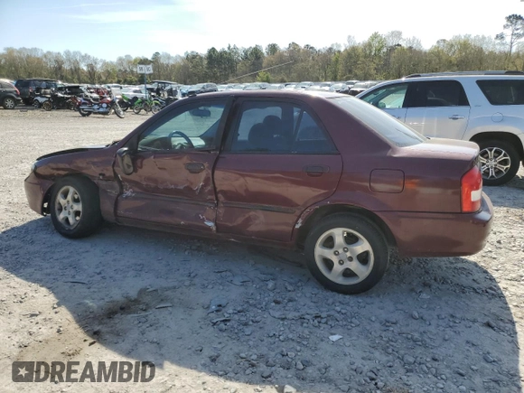 2003 Mazda Protege DX with VIN JM1BJ225030144551, listed as a Copart auction lot 50769905 with 179,876 mi miles and Salvage Title. Bid and sale history available at DreamBid. Image 2.
