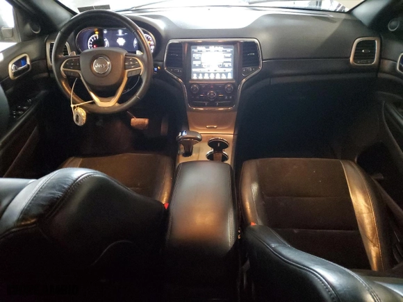 2015 Jeep Grand Cherokee Laredo with VIN 1C4RJFAG2FC828769, listed as a Copart auction lot 86611744 with 84,616 mi miles and Salvage Title. Bid and sale history available at carsss.com. Image 8.