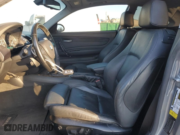 2009 BMW 1 Series 128i with VIN WBAUP73589VK74895, listed as a Copart auction lot 88375515 with 173,027 mi miles and Salvage Title. Bid and sale history available at carsss.com. Image 7.