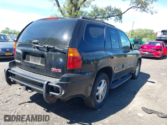 2005 GMC Envoy SLE z VIN 1GKDT13S452198027, wystawiony jako IAAI lot #42243258 z przebiegiem 144 240 mil mil oraz . Historia ofert i sprzedaży dostępna na DreamBid. Obrazek 4.