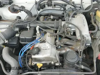 1999 Toyota Tacoma with VIN 4TAVL52N0XZ472509, listed as a IAAI auction lot 42838081 with 204,409 mi miles and . Bid and sale history available at DreamBid. Image 14.