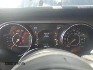 2021 Jeep Wrangler Unlimited Willys with VIN 1C4HJXDN0MW859686, listed as a Copart auction lot 56657725 with 49,984 mi miles and Salvage title. Bid and sale history available at DreamBid. Image 9.