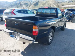 2002 Toyota Tacoma z VIN 5TENL42N92Z064523, wystawiony jako IAAI lot #42228845 z przebiegiem 305 172 mil mil oraz . Historia ofert i sprzedaży dostępna na DreamBid. Obrazek 4.