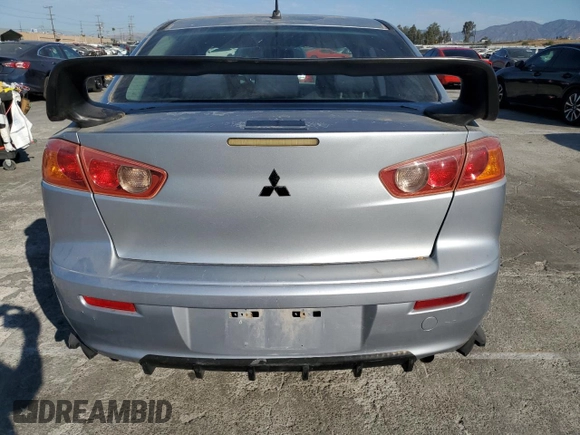 2009 Mitsubishi Lancer DE with VIN JA3AU16U49U002007, listed as a Copart auction lot 70722184 with 152,607 mi miles and Salvage Title. Bid and sale history available at carsss.com. Image 6.