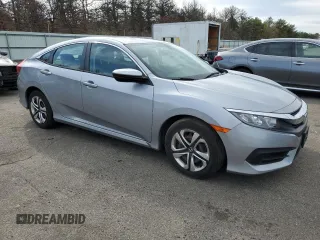 2017 Honda Civic LX z VIN 2HGFC2F52HH551152, wystawiony jako Copart lot #52728275 z przebiegiem 64 376 mil mil oraz Szkoda całkowita • Salvage title. Historia ofert i sprzedaży dostępna na DreamBid. Obrazek 4.