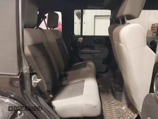 2008 Jeep Wrangler Unlimited X with VIN 1J4GA391X8L558984, listed as a IAAI auction lot 41016498 with 123,308 mi miles. Bid and sale history available at carsss.com. Image 8.