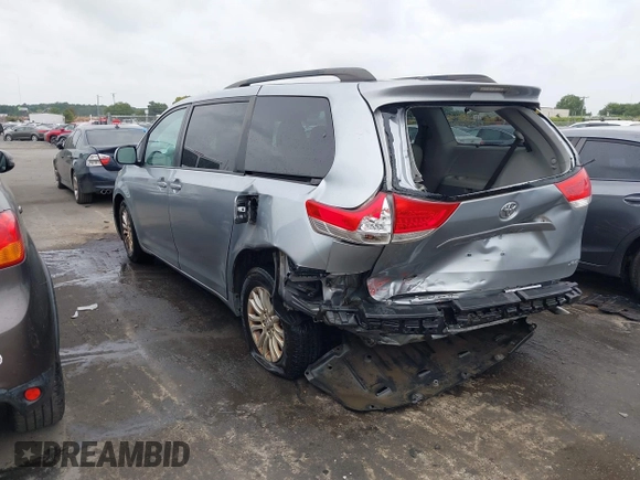2012 Toyota Sienna XLE AAS with VIN 5TDYK3DC6CS243008, listed as a IAAI auction lot 40351580 with 157,752 mi miles and . Bid and sale history available at DreamBid. Image 3.
