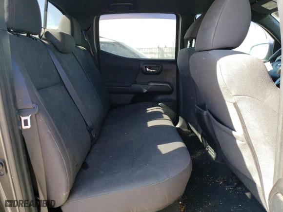 2018 Toyota Tacoma SR with VIN 3TMCZ5AN0JM139859, listed as a Copart auction lot 48006525 with 104,920 mi miles and Salvage Title. Bid and sale history available at carsss.com. Image 10.