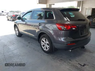 2013 Mazda CX-9 Sport with VIN JM3TB2BAXD0407958, listed as a IAAI auction lot 42346949 with 132,855 mi miles and . Bid and sale history available at DreamBid. Image 3.