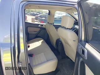 2019 Ford Ranger XL with VIN 1FTER4FH2KLA21790, listed as a IAAI auction lot 41982182 with 51,313 mi miles and . Bid and sale history available at DreamBid. Image 8.